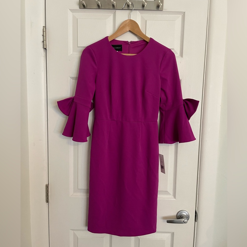 Donna Morgan dress. Size 0. New with tags. Fitted, professional, long sleeve